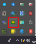 L'icône du gestionnaire de certificats CPS est une petite carte jaune dans les icônes cachées de Windows.